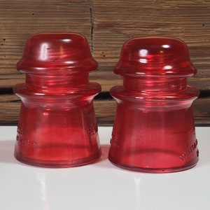 2 Authentic Vintage Medium Size Glass Insulators  Colorized Red. Set Of 2 Antique Colorized Red Insulators.