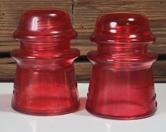 2 Authentic Vintage Medium Size Glass Insulators  Colorized Red. Set Of 2 Antique Colorized Red Insulators.