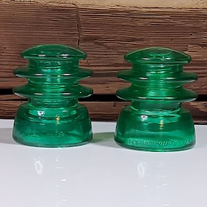 2 Authentic Vintage Glass Insulators Green Colorized Set Of 2.  New Store, Experienced Seller.
