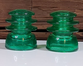 2 Authentic Vintage Glass Insulators Green Stained Set Of 2.  New Store, Experienced Seller.
