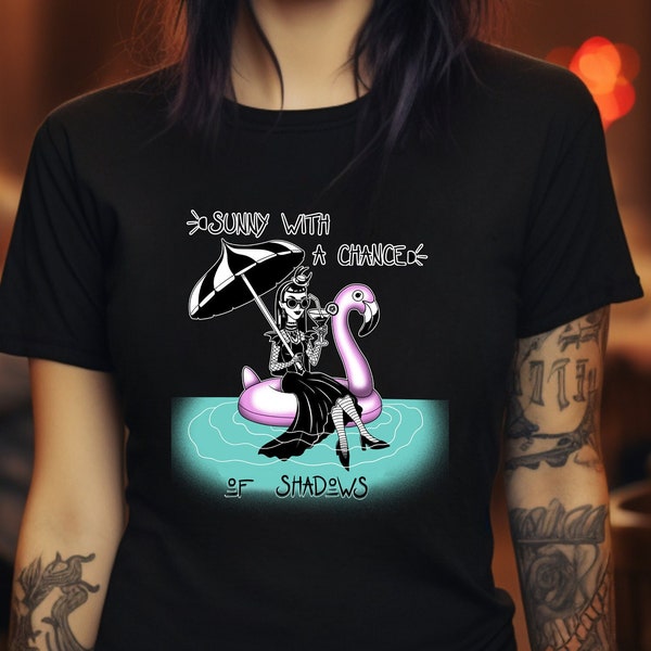 Whimsigoth Vacation Tee: Poolside Goth Girl on a Flamingo | Sunny with a Chance of Shadows | Tee in Black or Black Heather | Sugar Tease