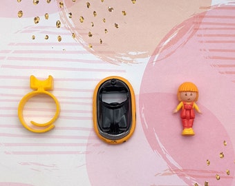 Midge's Bumper Car Polly Pocket Ring Complete zeldzame zwart-oranje variant 1989 | Perfect als nostalgisch cadeau of aanvulling op een collectie