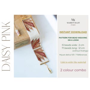 May include: A beaded bracelet with a leaf pattern in shades of pink, brown, and white, with gold-coloured metal accents. The text "DAISY PINK" is on the left. The pattern is 2 cm wide and 12 cm long.
