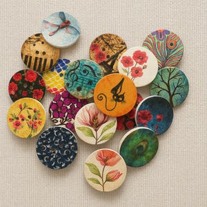 May include: A collection of decorative wooden buttons with various designs. The buttons feature floral patterns, musical notes, a dragonfly, a cat, and other artistic elements. The buttons are round and vary in color.
