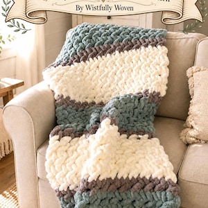 May include: A chunky hand-knitted blanket in a Seaglass Serenity pattern, draped over a beige sofa. The blanket features alternating stripes of cream, grey, and teal blue. The text "Seaglass Serenity" and "Chunky Hand Knit Blanket PDF Pattern" are visible.