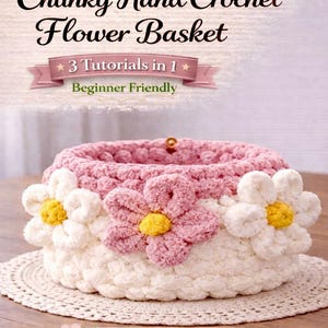 May include: A handmade, chunky crochet flower basket in white and pink, adorned with large flower appliqués. The basket is on a lace doily. Text on the image reads "Chunky Hand Crochet Flower Basket" and "Mother's Day or Any Occasion DIY with Chunky Yarn."