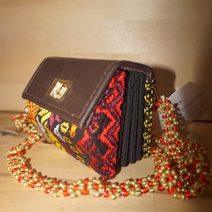 Sisu - Cartera de diseño Origami