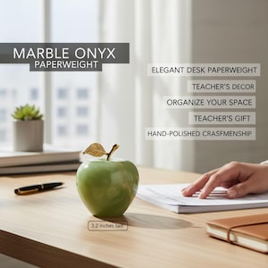 May include: A green marble onyx apple paperweight, 3.2 inches tall, with a gold-colored leaf and stem. The desk accessory is hand-polished and suitable for teacher's decor.