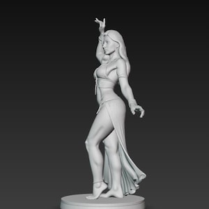 May include: A grayscale sculpture of a woman in a flowing, open-front skirt and a halter top, posed in a dance-like stance. Her arm is raised, and she is standing on a circular base. The sculpture has detailed features and is set against a dark background.
