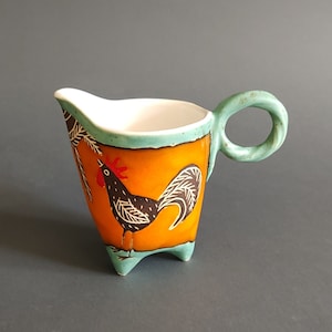 Handmade Orange Ceramic Creamer: Rooster Accent, Pottery Milk Jug