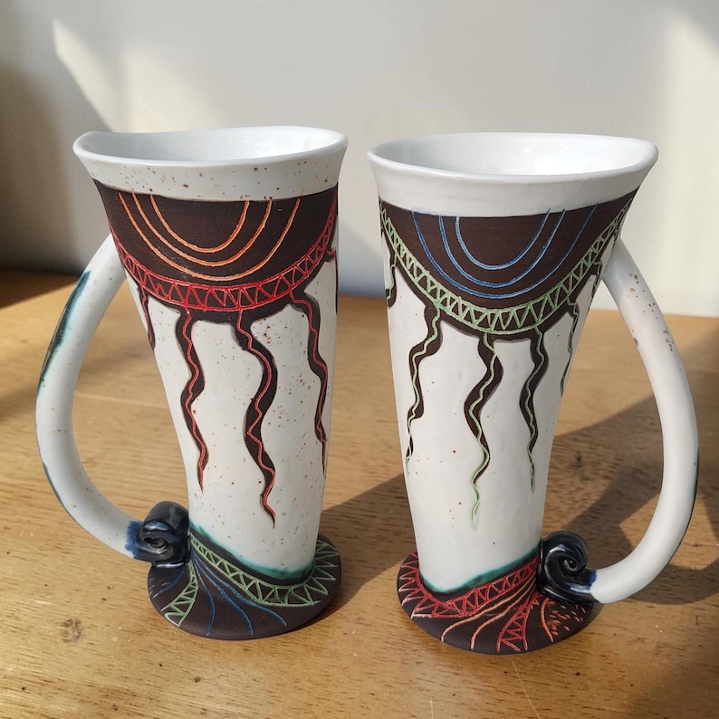 tall ceramic bird mugs handmade pottery back view design details