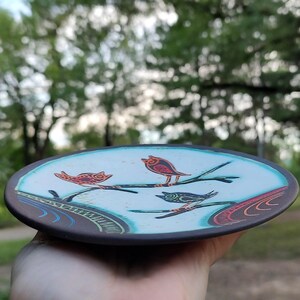 handmade ceramic plate shallow depth of field soft background