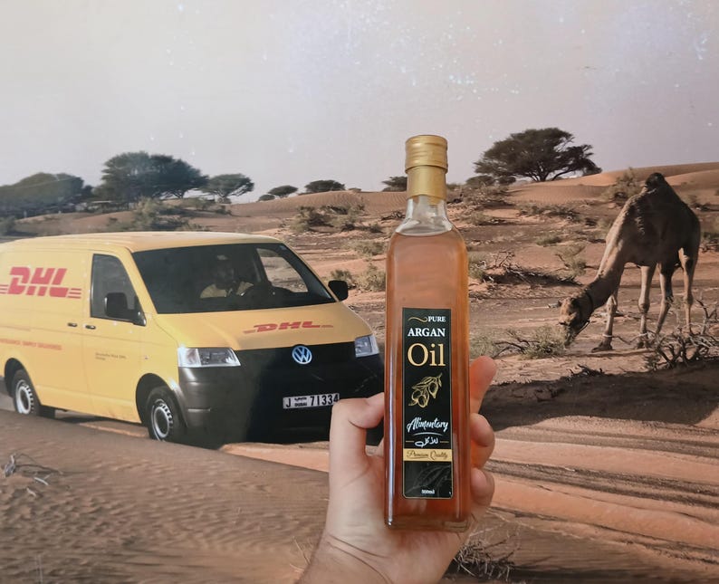 Moroccan argan oil bottle outdoor natural origin desert background