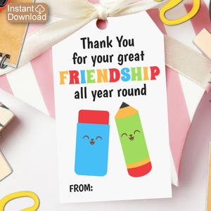 May include: A white gift tag with a colorful cartoon eraser and pencil. The tag says "Thank You for your great FRIENDSHIP all year round" and has a space to write "FROM:"