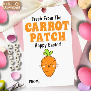 May include: A white gift tag with the text "Fresh From The Carrot Patch Happy Easter!" and a cartoon carrot with a smiling face. The tag is surrounded by pink and orange Easter eggs.