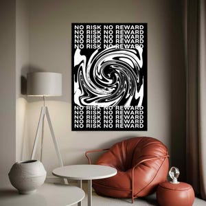 May include: A black and white abstract art print with the text "NO RISK NO REWARD" repeated. The artwork features a swirling design. The print hangs above a brown leather chair and a small white table.