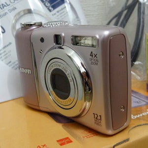 NEW Canon PowerShot A1100 IS 12.1MP Digital Camera Rare Pink Never Used image 3