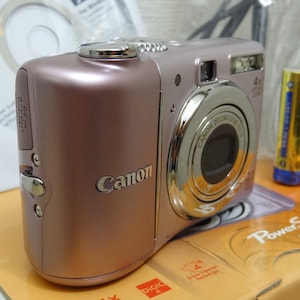 NEW Canon PowerShot A1100 IS 12.1MP Digital Camera Rare Pink Never Used image 2