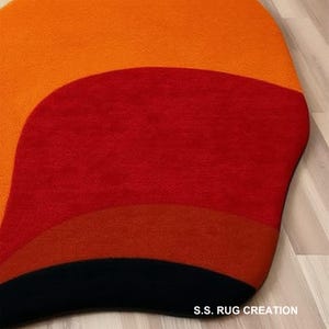 Modern Abstract Rug – Wavy Multicolor Design in Red, Orange, Black & Beige For Living Rooms image 3