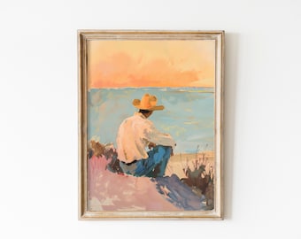 May include: A framed painting of a person wearing a straw hat sitting on a hill overlooking a body of water with a sunset in the background.