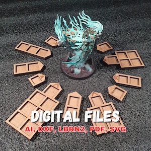 Peut inclure: Fichiers numériques pour la découpe au laser, y compris les formats AI, DXF, LBRN2, PDF et SVG. Les fichiers représentent un ensemble de neuf plateaux rectangulaires en bois à plusieurs compartiments avec des coins arrondis.