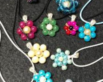 SET of 10 Beaded Flower Pendants with cords. Cord Necklaces. Handcrafted About 3/4" to 1.25"  Wide Pendants SALE ! Shipped with TRACKING