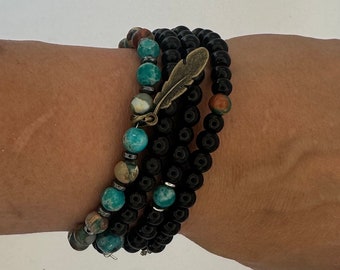 Turquoise and black glass beaded bracelet set of 4