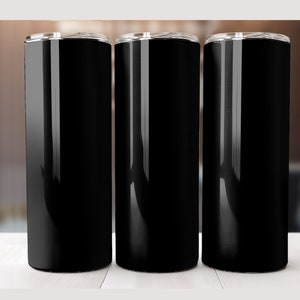 May include: Three black stainless steel tumblers with a glossy finish. The tumblers are empty and sitting on a white surface.