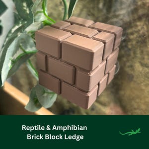 May include: A brown brick block ledge for reptiles and amphibians. The ledge is made of a 3D printed material and has a textured surface.