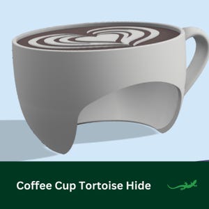 May include: A white coffee cup with a unique tortoise hide design. The coffee inside has a heart-shaped latte art design. The cup has a handle and a curved base, and the text "Coffee Cup Tortoise Hide" is at the bottom.