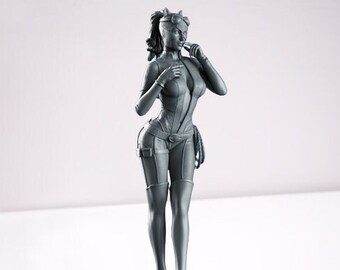 May include: A gray, detailed figurine of a woman wearing a form-fitting outfit with a belt and boots. The figurine has a sculpted ponytail and a mask over her eyes.