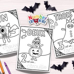 May include: Three Halloween-themed coloring pages with the numbers one, two, and three in French. Each page features a cartoon character and the word for the character in French. Black paper bats and crayons are also visible.