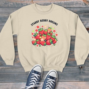 Fresas y sueños de bayas estrelladas Sudadera unisex estilo dibujos animados, suéter gráfico retro, estilo moderno y divertido