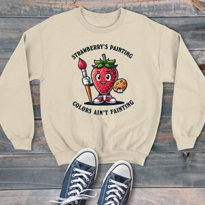 Strawberry Painter Berry Painting Estilo de dibujos animados Sudadera unisex, suéter gráfico retro, estilo moderno y divertido