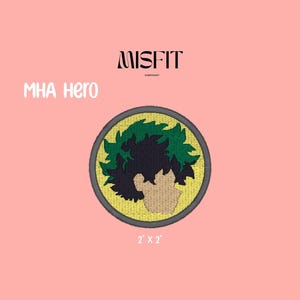 May include: Embroidered patch featuring a character design from "MHA Hero". The patch is round, with a yellow and gray border, and depicts a character with green hair and a tan face. The text "Misfit" and "MHA Hero" are also visible. The patch measures 2 x 2 inches.