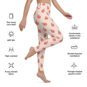 May include: Peach print leggings with a high-waisted, double-layered waistband. The leggings are made of 4-way stretch fabric and have a triangle-shaped gusset crotch. The leggings also have a tear-away care label and UPF 50+ sun protection.