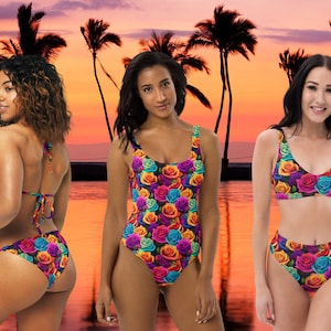 May include: Three women wearing different swimsuit styles with a colorful rose print. The swimsuits are a bikini top and bottom, a one-piece swimsuit, and a high-waisted bikini bottom and top.