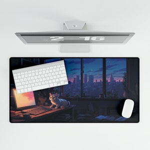 May include: A black and white mousepad with a cityscape and a cat sitting on a desk with a keyboard and a computer monitor. The mousepad has a city skyline with a sunset in the background. The cat is white with black spots and is looking at the camera. The keyboard is white and has black keys. The computer monitor is black and has a white screen.