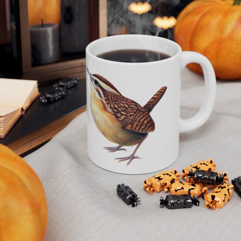 11 oz Ceramic Coffee Mug with "Bird Nerd" text on one side, and a Carolina wren illustration on the other.