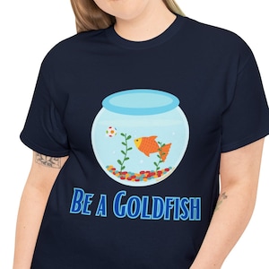 Be a Goldfish Inspirational Soccer T-Shirt | Choose from Multiple Colors | Lasso T-Shirt