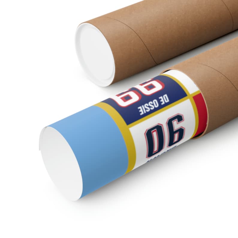 May include: A rolled up poster with a blue, yellow, red, and white design. The poster features the text "DE OSSIE 96" in navy blue and white.