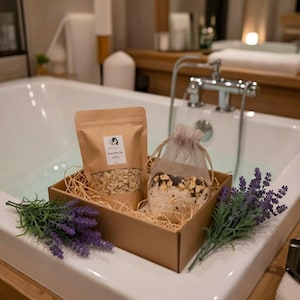 May include: A set of three ceramic mugs with a speckled, matte finish in cream, light grey, and dark grey. Each mug has a simple, modern design and a rounded handle.