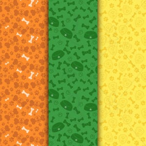 May include: Three vertical panels with repeating patterns. The patterns include dog bones, paw prints, and dog bowls. The first panel is orange, the second is green, and the third is yellow. The dog bowls have a star on them.