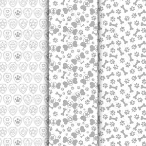 May include: Three seamless patterns featuring dog-themed designs. One pattern has paw prints, bones, and badges. Another has badges, anchors, stars, and paw prints. The third pattern has paw prints and bones. All patterns are in shades of gray and white.