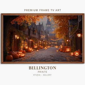 May include: A framed print of a cobblestone street lined with buildings and lit by glowing jack-o'-lanterns and street lamps. The image is framed in a brown wooden frame. The text "PREMIUM FRAME TV ART" is at the top.
