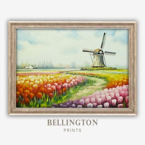 Puede incluir: Una pintura enmarcada de un molino de viento en un campo de tulipes de colores. El molino de viento tiene una base blanca y aspas marrones. Las tulipes son en tonos de rosa, rojo, naranja y amarillo. El cielo es azul con nubes blancas.