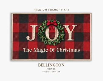 May include: A framed Christmas-themed art print with a red and black buffalo plaid background. The word "JOY" is displayed with a wreath in the center. The text "The Magic Of Christmas" is below the word "JOY".