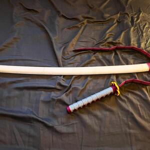 blade wrapping around scabbard