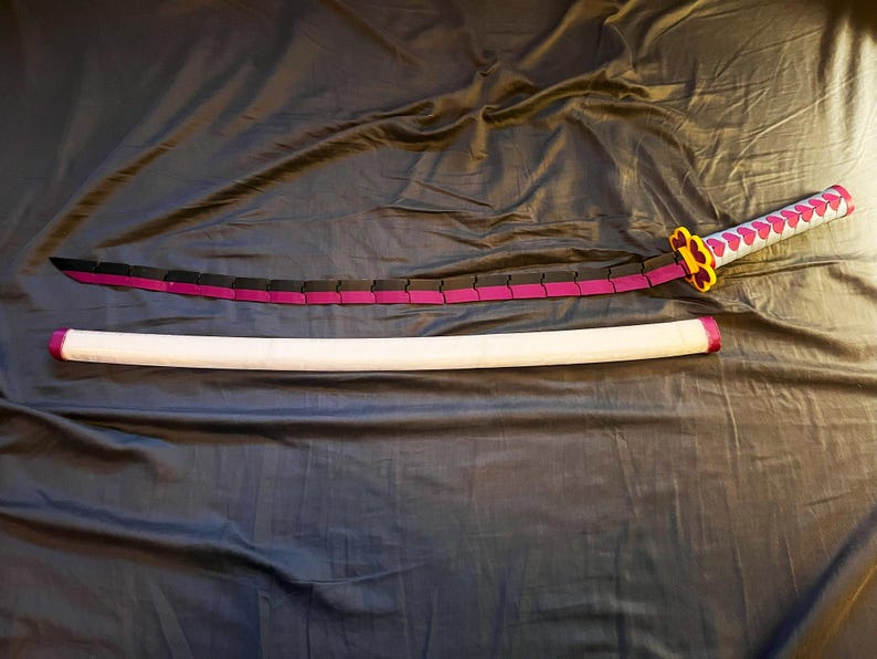 Blade straight next to scabbard