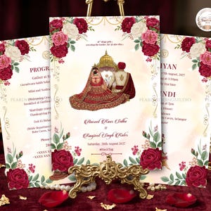 May include: Wedding invitation cards with a floral design. The cards feature a central illustration of a couple in traditional attire under a golden canopy. The cards are adorned with burgundy and pink roses, with text including names and event details.